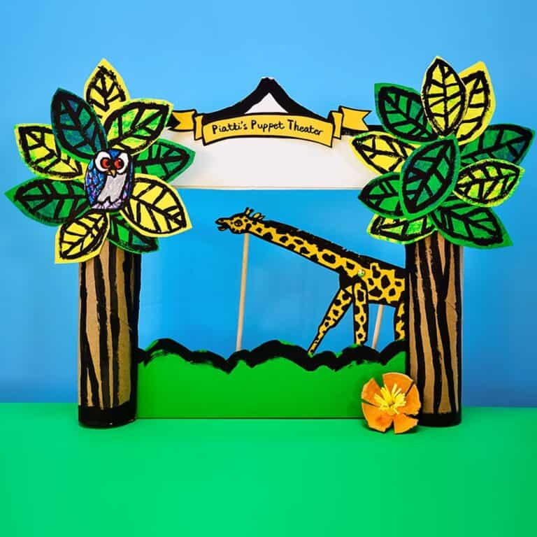 Example of DIY cardboard puppet theater with giraffe.