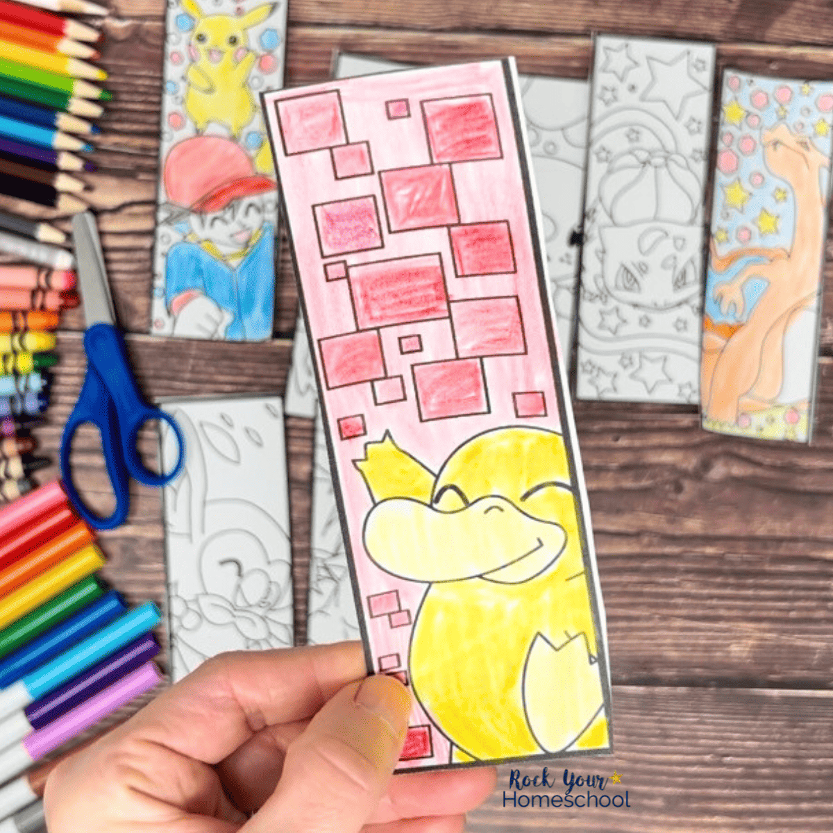 Woman holding Psyduck bookmark with other free printable Pokemon bookmarks in background.