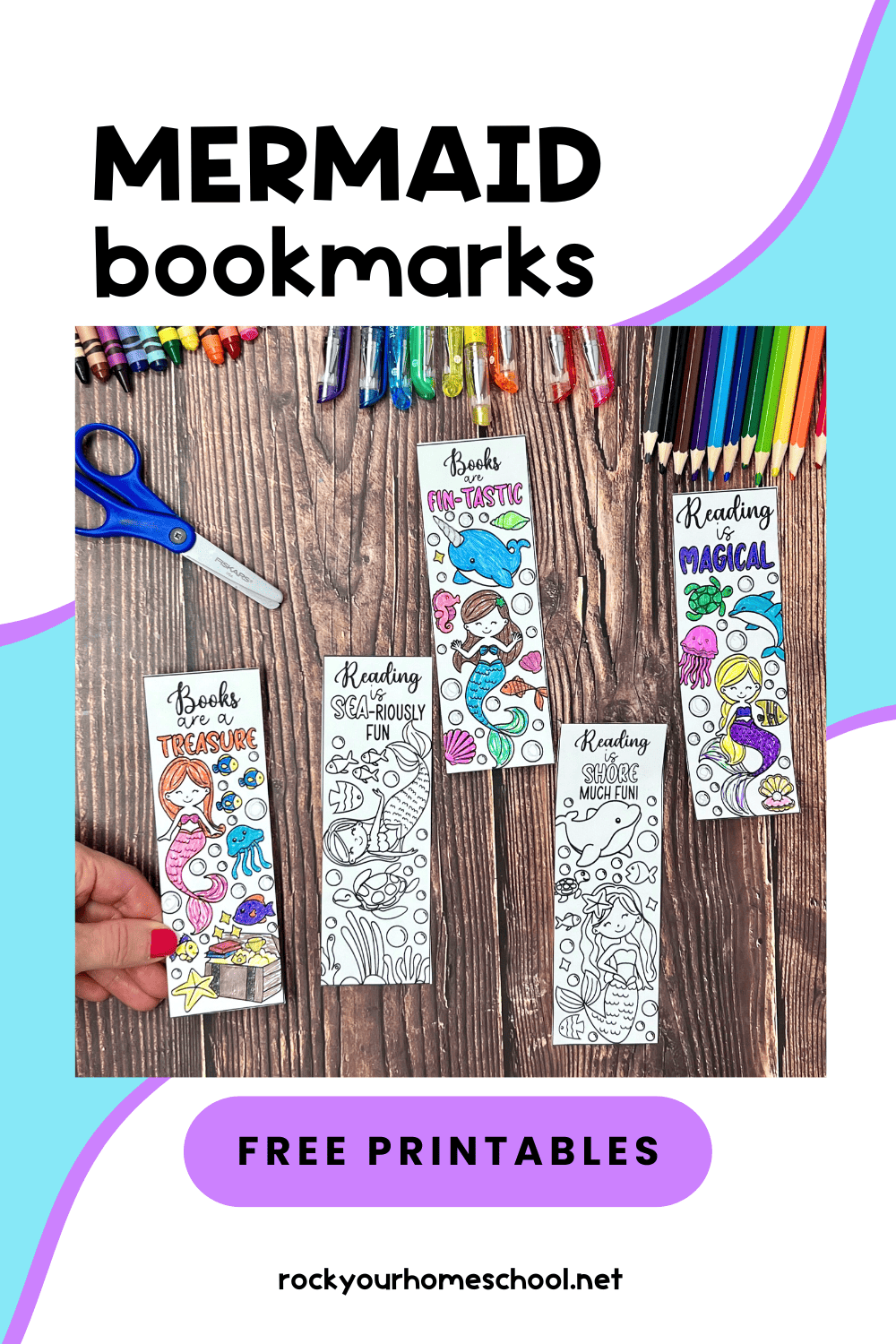 Woman holding examples of free printable mermaid coloring bookmarks with scissors, color pencils, crayons, and glitter gel pens.