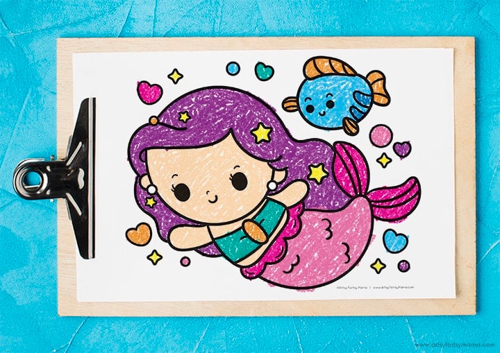 Free printable mermaid coloring page with cute fish and sparkles.