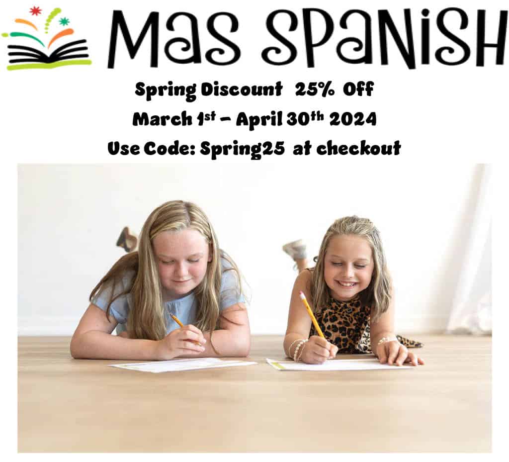 Two girls working on Mas Spanish.