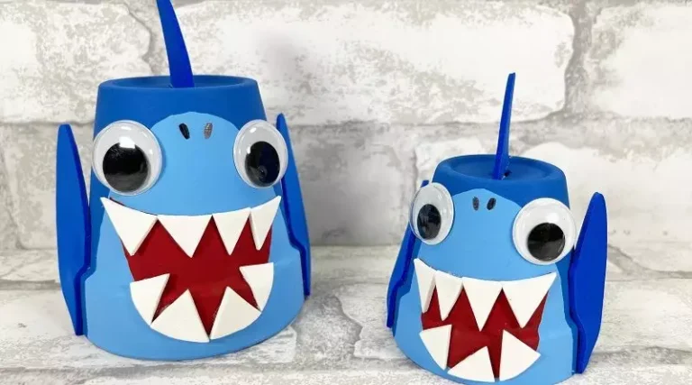 Two examples of Dollar Tree clay pot sharks kids craft.