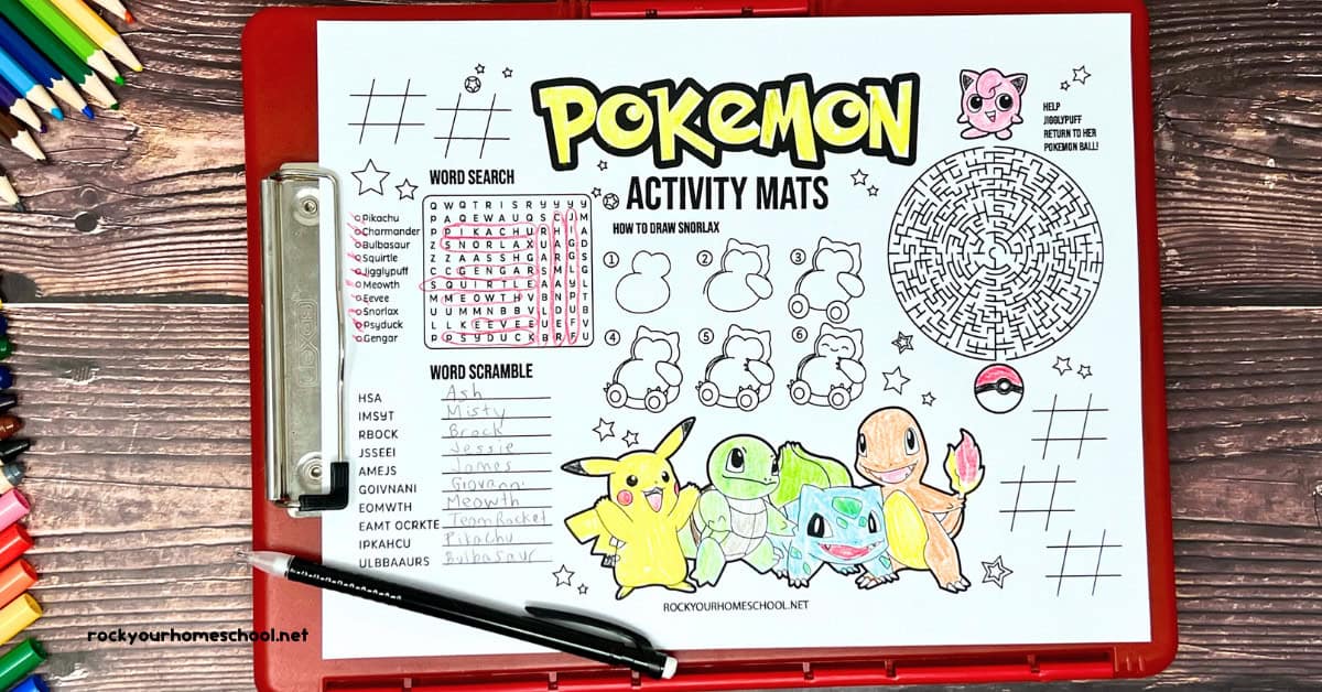 Example of Pokemon activity mat on red clipboard with pencil, color pencils, and markers.