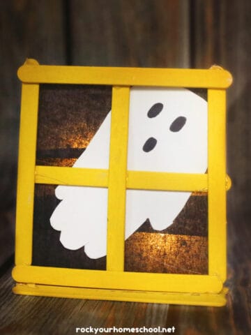 Example of glowing ghost handprint craft for kids.