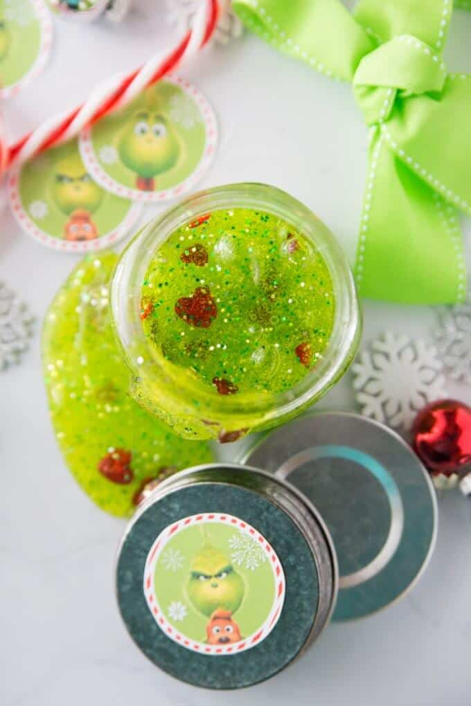 Example of Grinch slime with red hearts, light green bow, and candy cane.