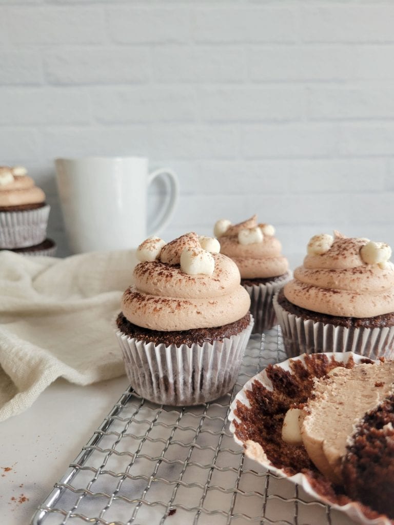 Examples of hot chocolate cupcakes with mini marshmallows.