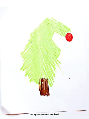 Example of easy Grinch craft featuring a fork painted tree.