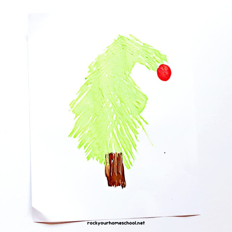 Example of easy Grinch craft featuring a fork painted tree.