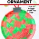 Example of easy paper plate craft featuring a red and green tissue paper ornament with red pipe cleaner.