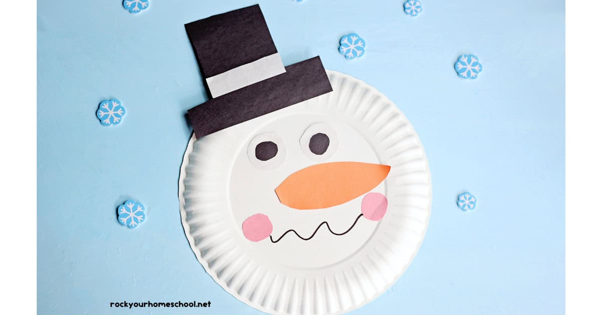 Example of simple paper plate snowman craft with snowflake mini-erasers.