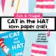 Red, light blue, and white paper, glue stick, and pencil with two examples of Cat in the Hat craft made with torn pieces of paper and book.