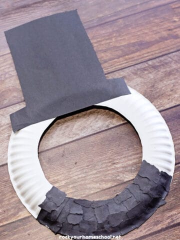 Example of simple Abraham Lincoln paper plate craft for kids to make a fun mask.