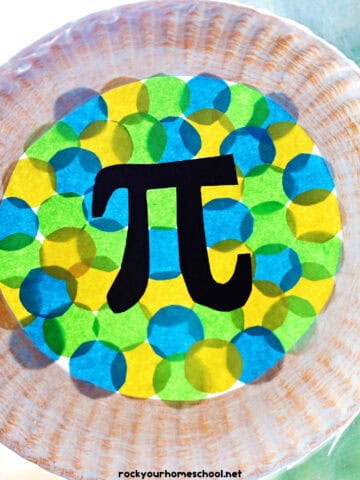 Example of Pi Day craft made with a paper plate and yellow, blue, and green circles of paper for a colorful suncatcher.