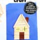 Example of popsicle stick log cabin craft on blue construction paper.