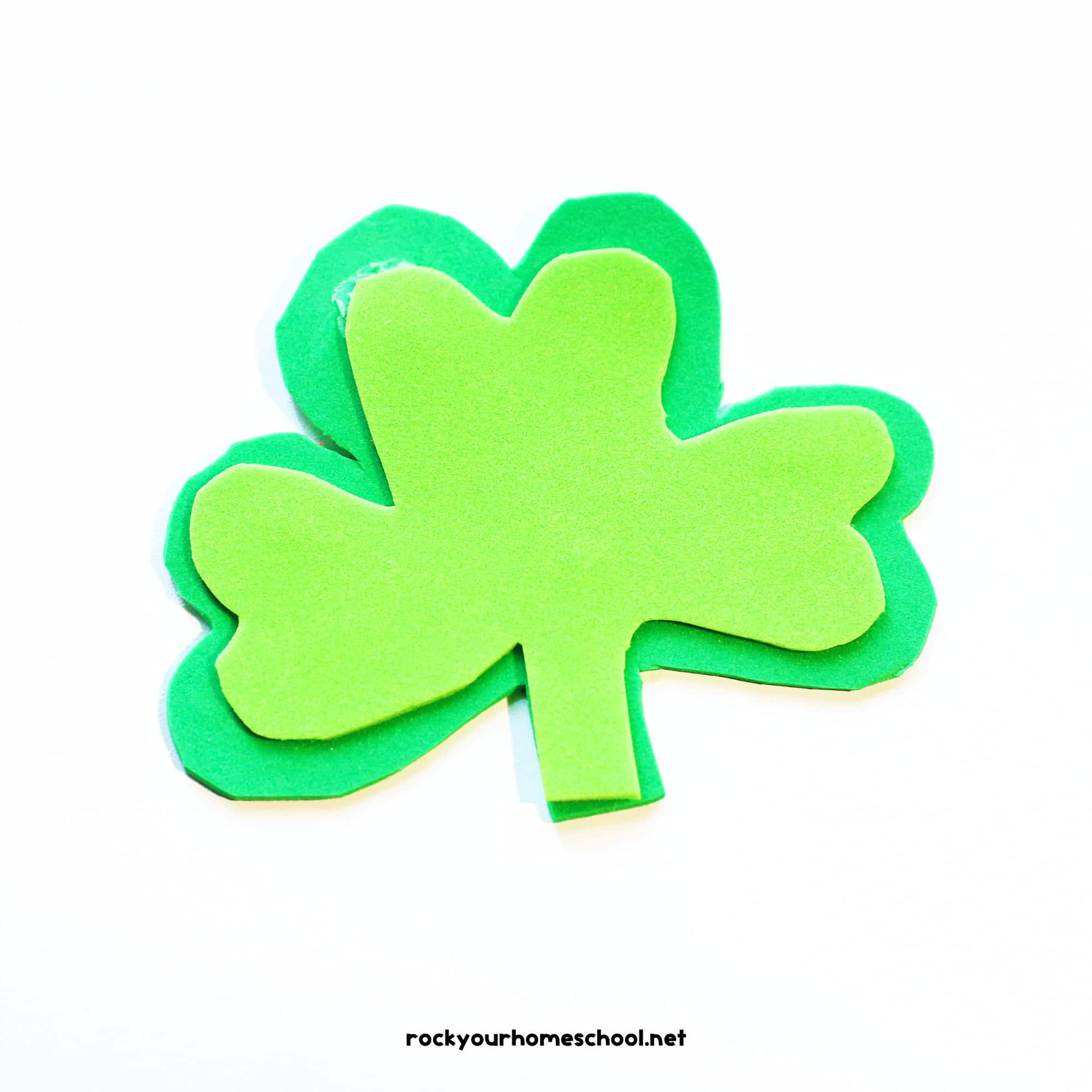 Light green foam sheet shamrock glued to darker green foam sheet shamrock.