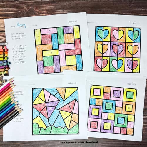 Four examples of Addition Color by Sums pages with crayons and color pencils.