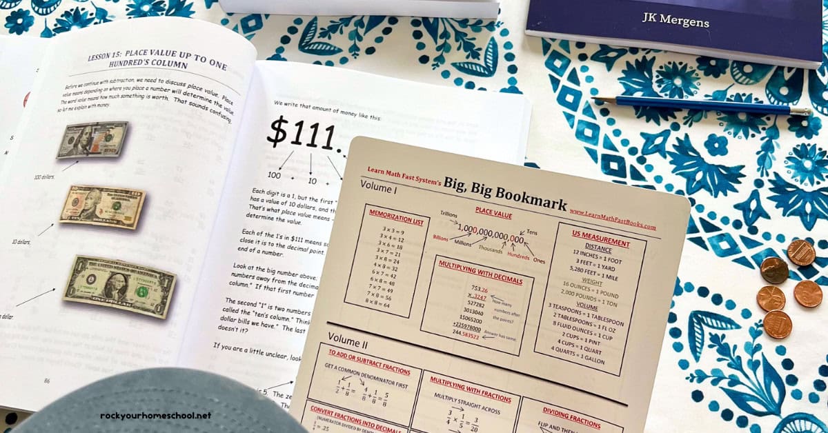 Boy using Big, Big Bookmark from Learn Math Fast curriculum with Volume 1 Basic Math place value lesson.