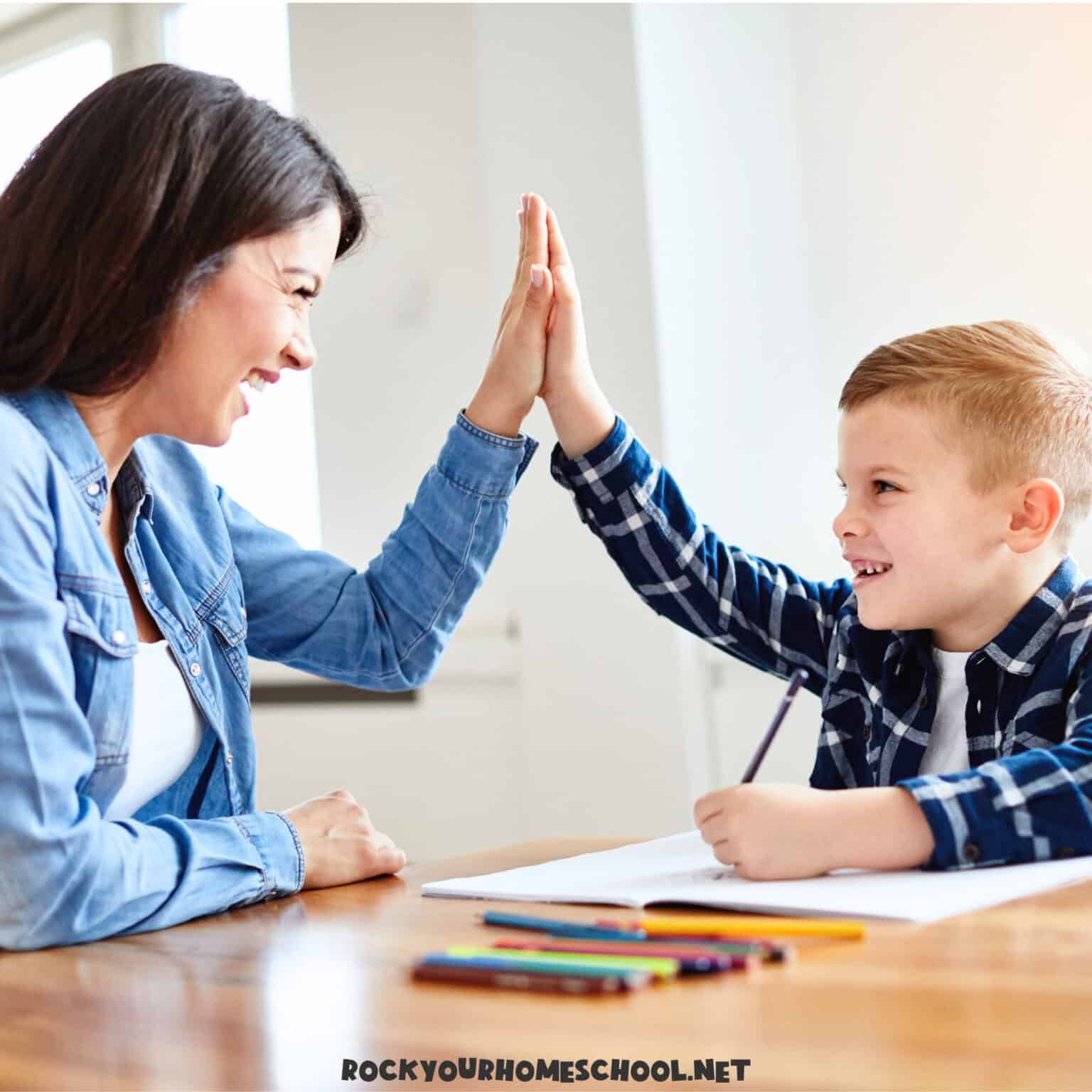 Mom high fiving son to feature homeschool wins.