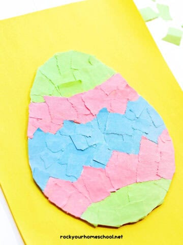 Example of torn paper Easter egg craft for kids on yellow paper.