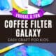 Blue spray bottle, coffee filters and washable markers with examples of coffee filter galaxy craft on black construction paper.