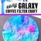 Blue spray bottle, coffee filters and washable markers with examples of coffee filter galaxy craft on black construction paper.