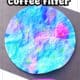 Example of galaxy craft for kids made with coffee filters and markers on black construction paper.