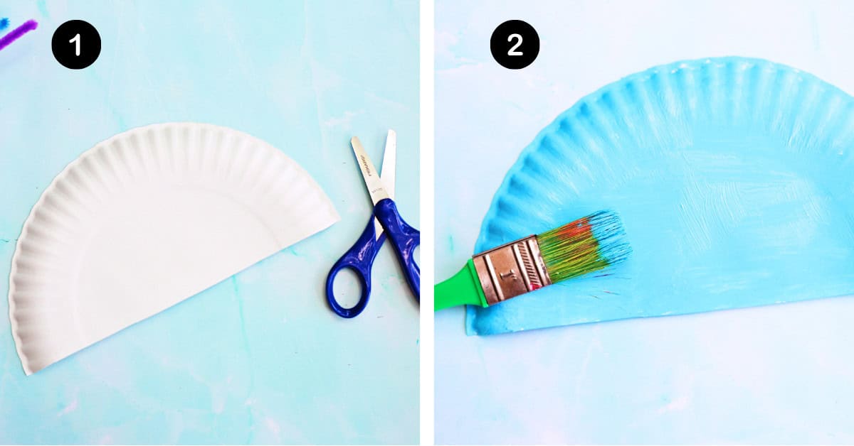 Half of paper plate with scissors and painted light blue.