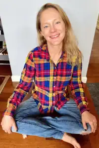 Amy, author of Rock Your Homeschool, sitting and smiling.