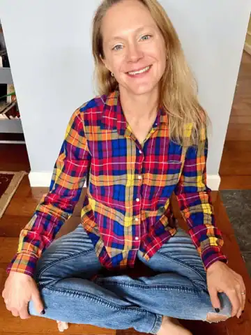 Amy, author of Rock Your Homeschool, sitting and smiling.