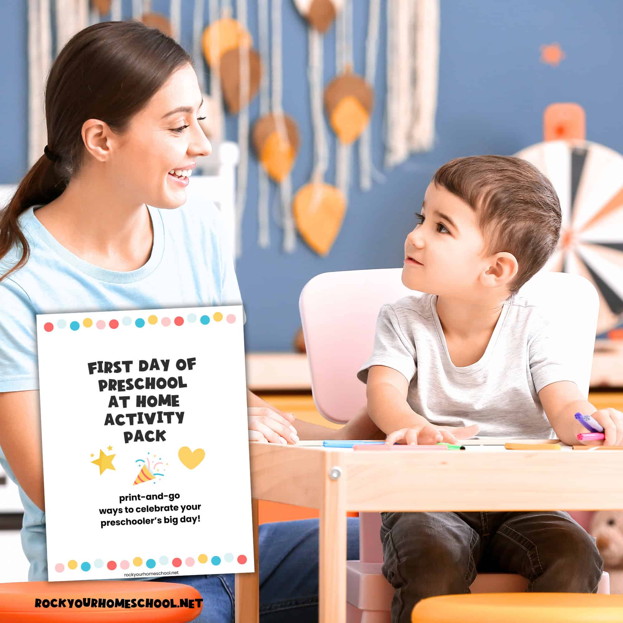 Mother and son at child's table to feature these first day of homeschool preschool activities and free printable activity pack.