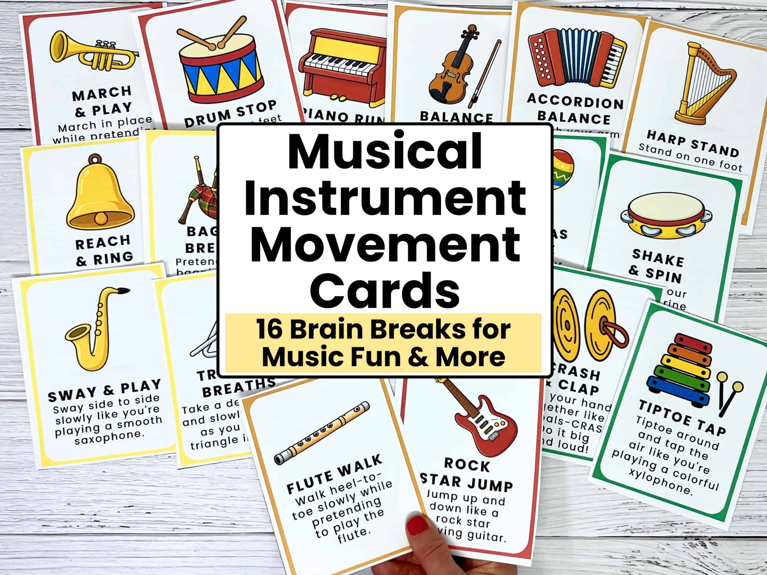 Woman holding examples of printable musical instrument movement cards for kids.