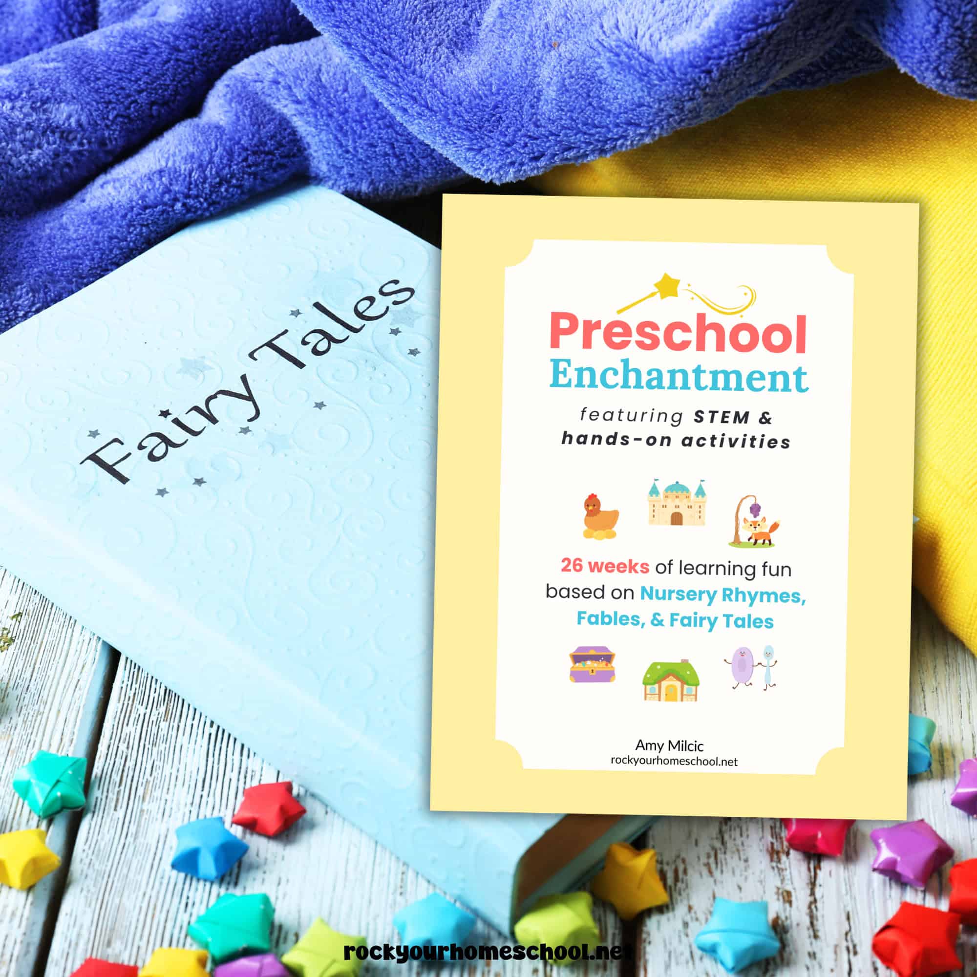 Fairy Tales book, blanket, and colorful wood beads with cover of Preschool Enchantment unit studies.