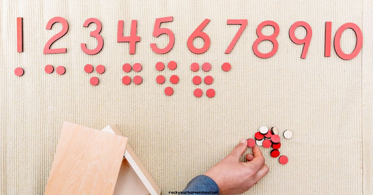 Preschooler using red wood circles as math manipulatives with numbers 1 through 10.