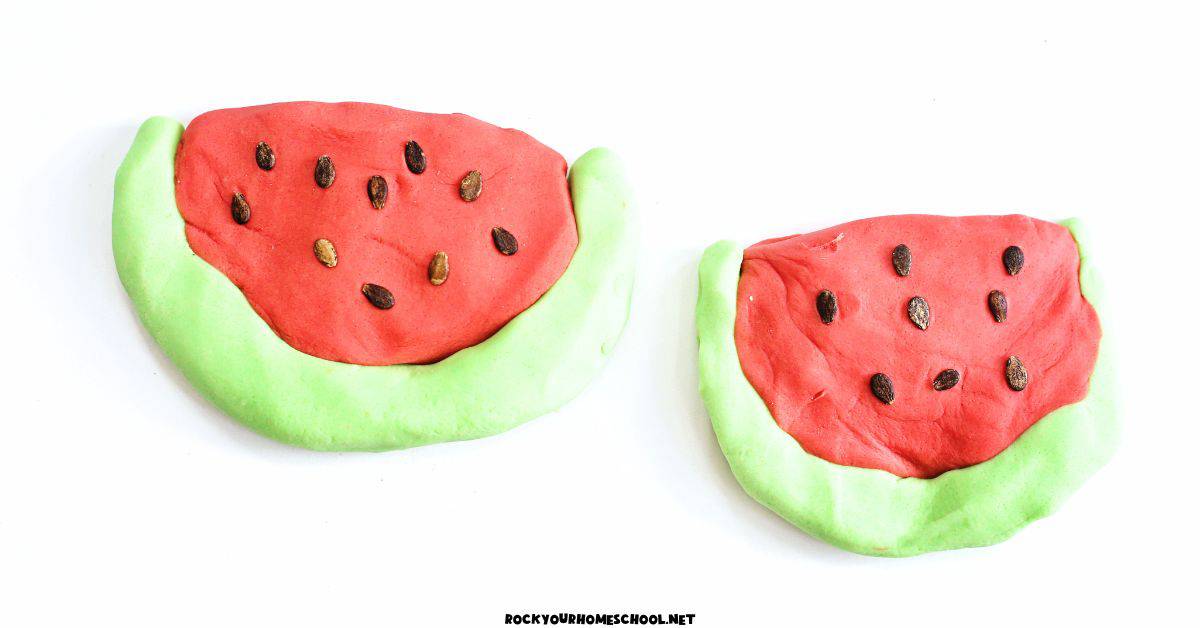 Two examples of watermelon playdough as slices with watermelon seeds.