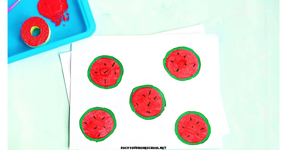 Watermelon stamp art with pool noodle and red paint.
