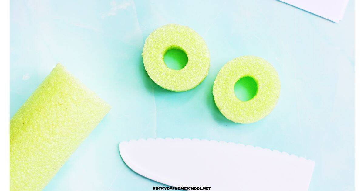 Pool noodle cut into slices with ceramic craft knife.