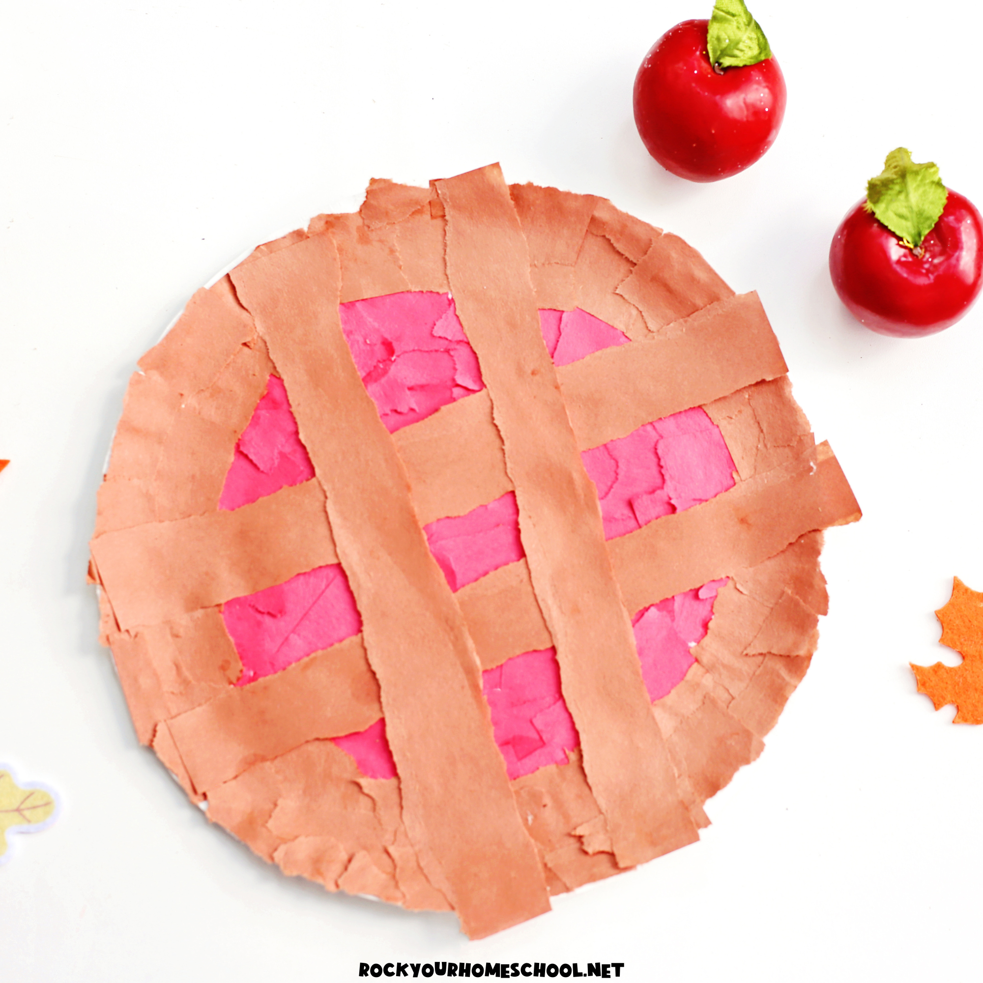 Example of torn paper apple pie craft made with paper plate.