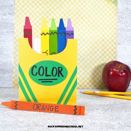 Example of craft stick crayon box craft with free template.