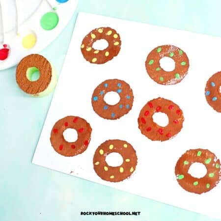 Example of easy donut craft made with DIY pool noodle stamp for fun painting project.