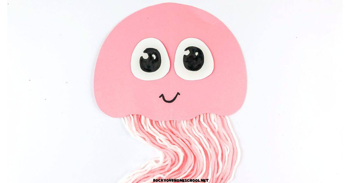 Cute paper jellyfish craft with yarn tentacles.