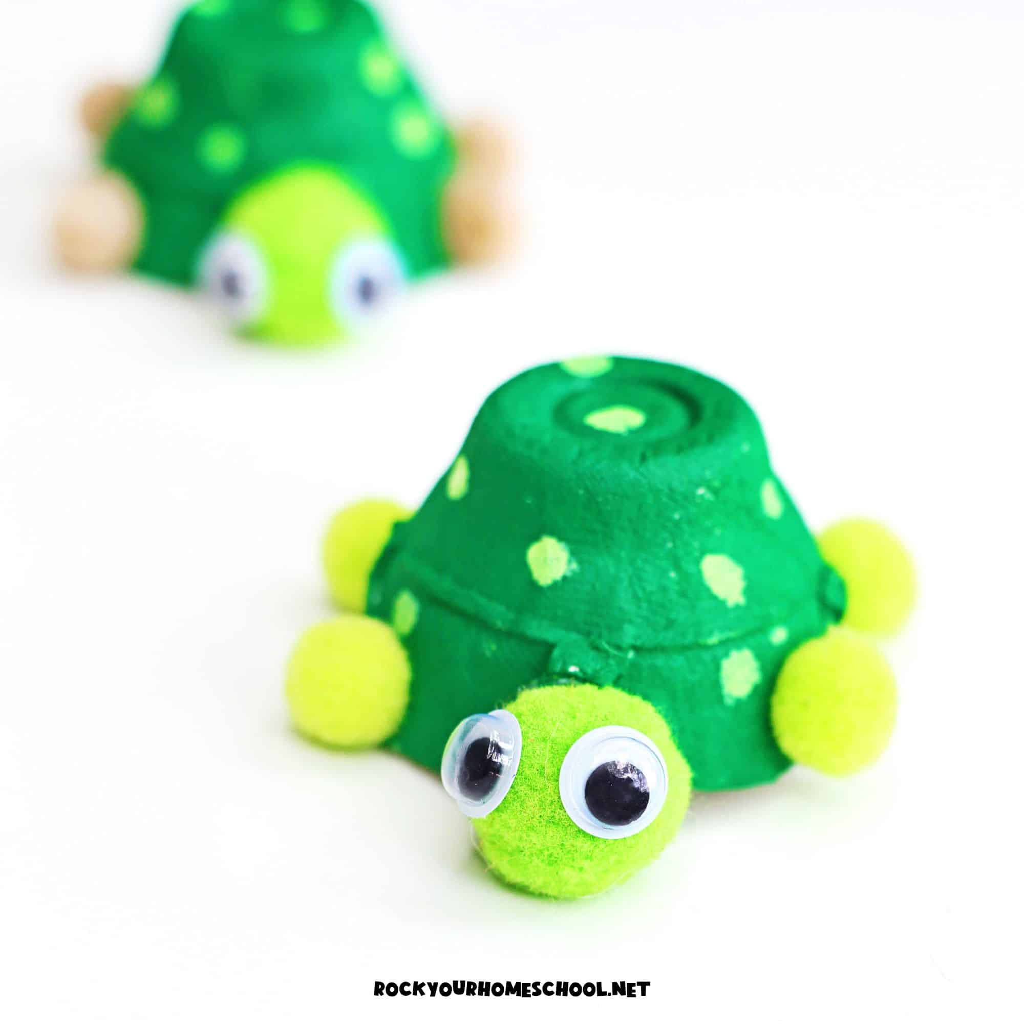 Two examples of easy egg carton turtle crafts with pom pom head and legs.