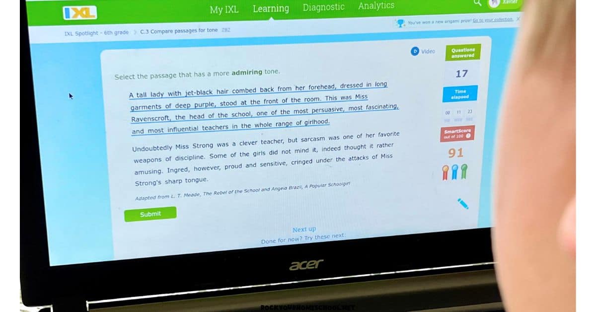 Middle school boy using laptop to work on language arts lessons on IXL.
