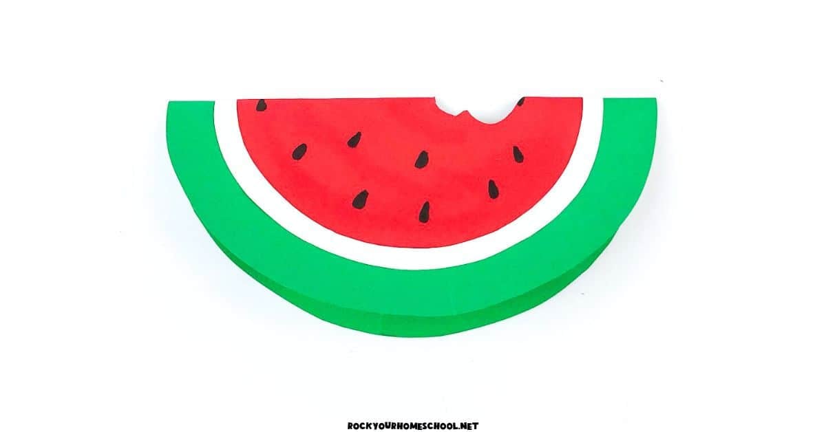 Example of paper watermelon craft that rocks with cut out bite.