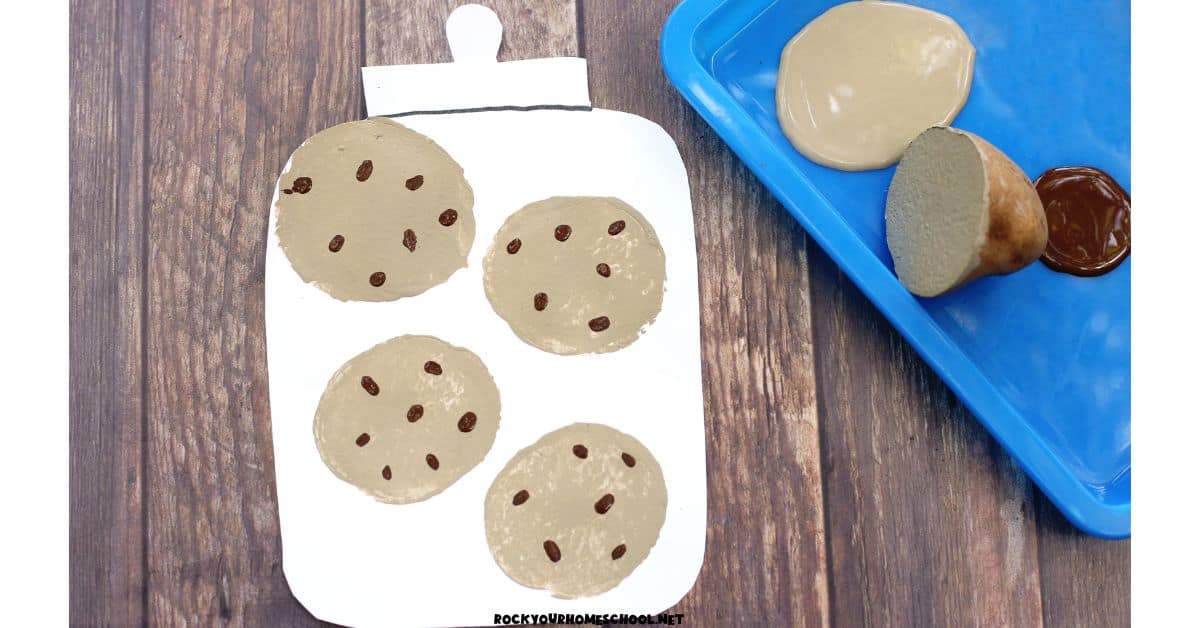 Example of easy cookie jar craft with DIY potato stamp and brown paint.