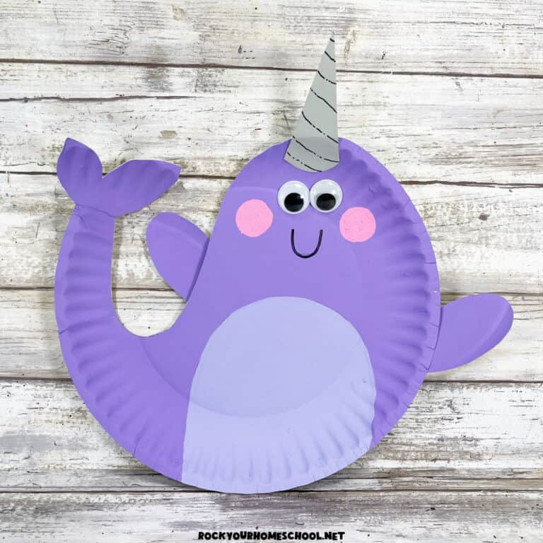 Example of cute purple paper plate narwhal craft for kids with free printable template.