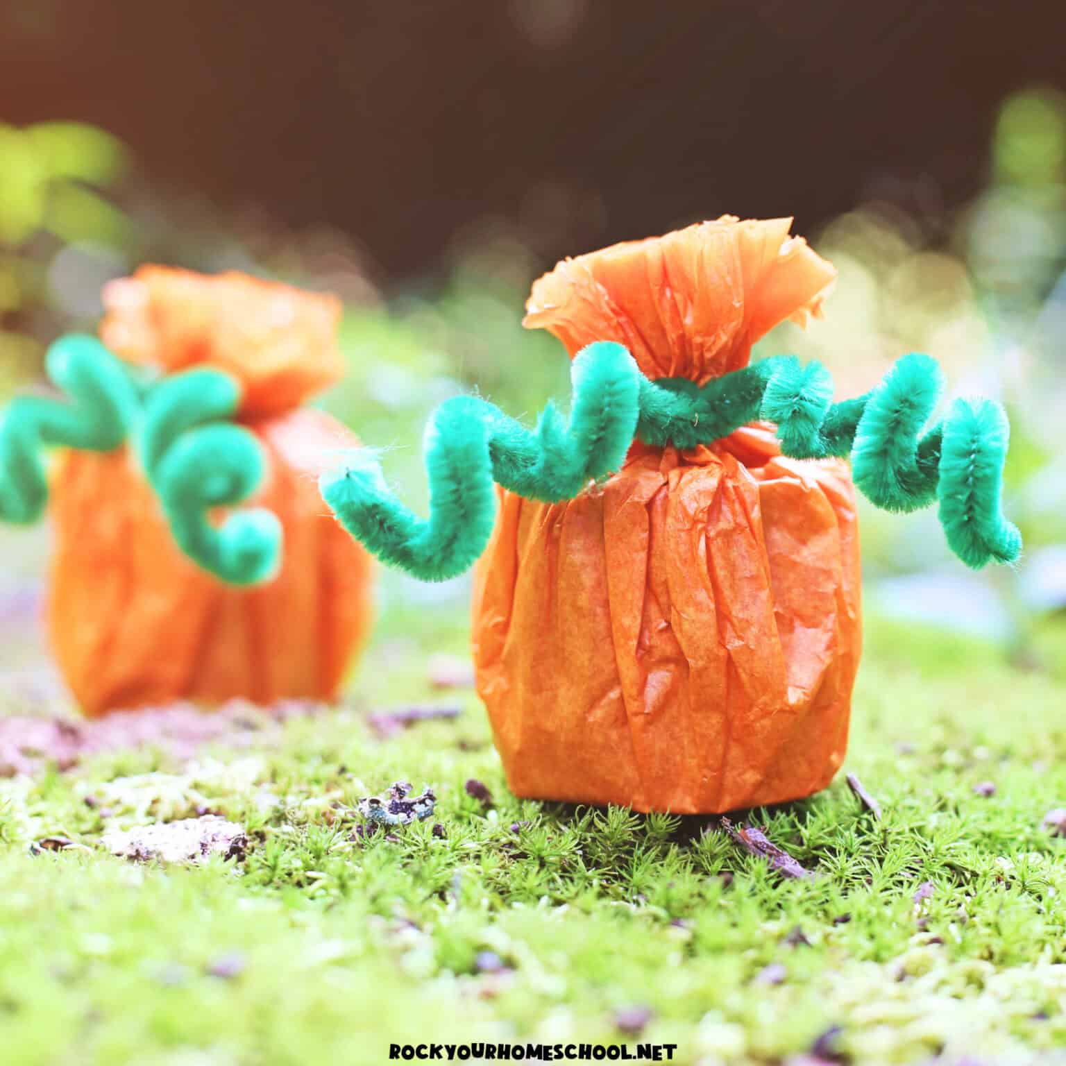 Two examples of toilet paper roll pumpkin crafts made with tissue paper and pipe cleaner.