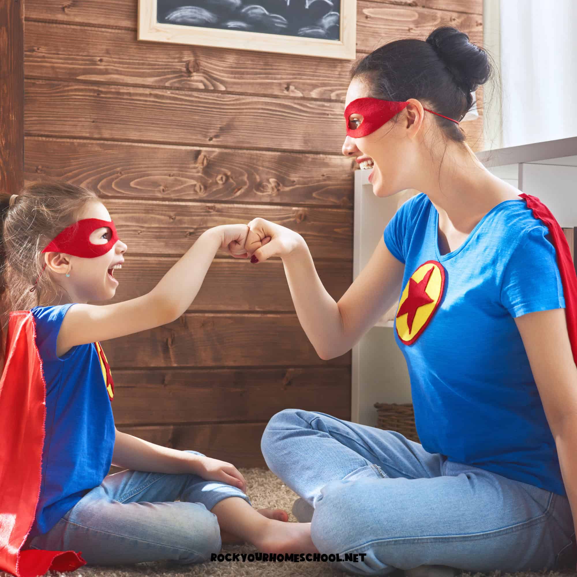 Happy mom and daughter with superhero masks and capes doing a fist bump to feature fun days made simple.