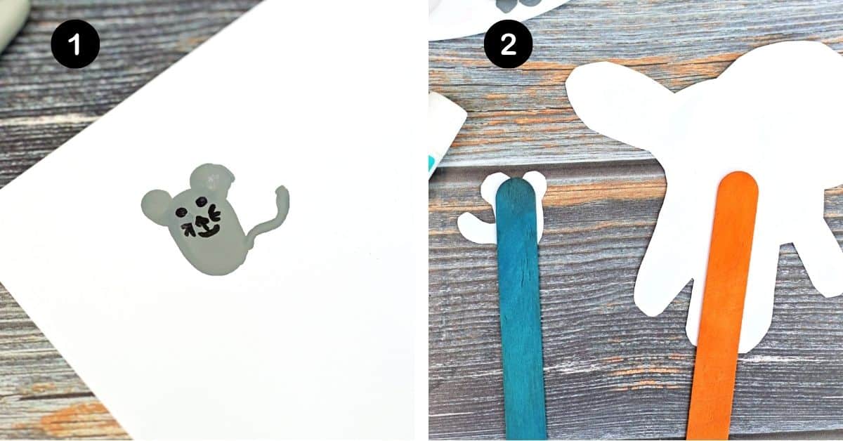 Gray thumbprint mouse with facial features made by black marker and wood craft sticks on back of The Lion and The Mouse puppets.