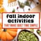 Child working on fall craft using leaves, berries, and acorns and pumpkin with pumpkin seeds to feature these fall indoor activities.