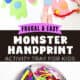 Child working on monster handprint craft with craft supplies on activity tray like construction paper, markers, pom poms, pipe cleaners, googly eyes, glue stick, and more with examples.